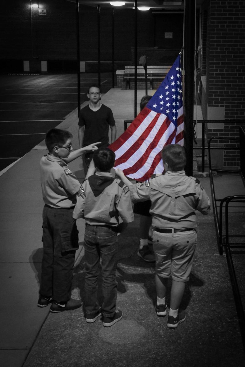 Practicing the raising and lowering of the flag