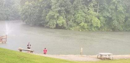 Our Scouts attempting to fish while the rain came down