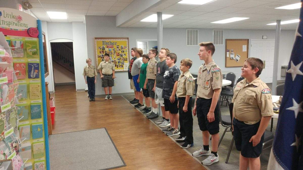 Lining up for flag retirement after the meeting - Troop 1086